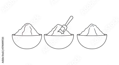 Three bowls with colored powder and a scoop in the yellow powder bowl