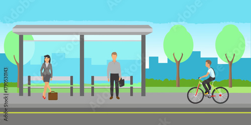 People waiting at a bus stop and a person riding a bicycle on a city street with trees and buildings