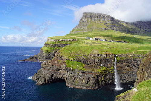 The stunning Mulafossur Waterfall in Gasadalur on the Faroe Islands