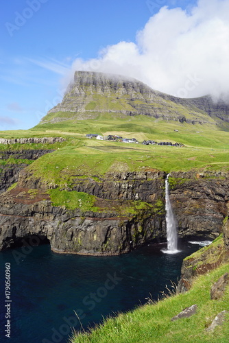 The stunning Mulafossur Waterfall in Gasadalur on the Faroe Islands