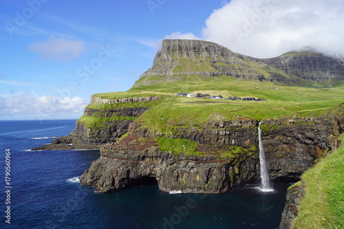 The stunning Mulafossur Waterfall in Gasadalur on the Faroe Islands