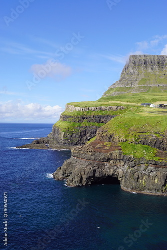 The stunning Mulafossur Waterfall in Gasadalur on the Faroe Islands