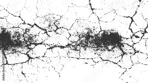 Black cracks and speckles on white background texture abstract