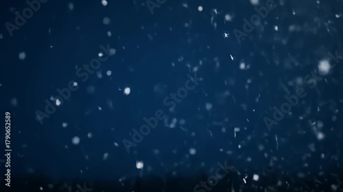 Realistic snowfall background on dark blue cold winter abstract effect