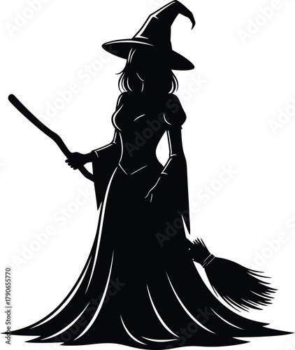 Elegant silhouette of a witch in a flowing gown holding a broomstick and wand