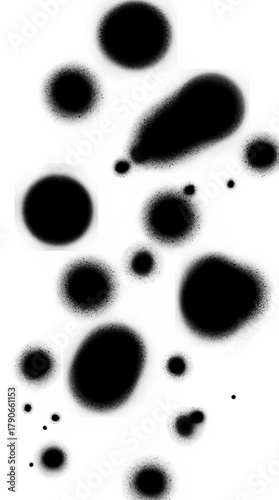 Numerous black ink drops and splashes on a white background. These abstract, circular, and irregular shapes vary in size and possess a gritty, spray-paint like texture.