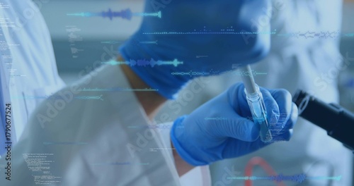 Pipetting hand in lab coat, nitrile gloves moving liquid into vial at lab bench, data overlay