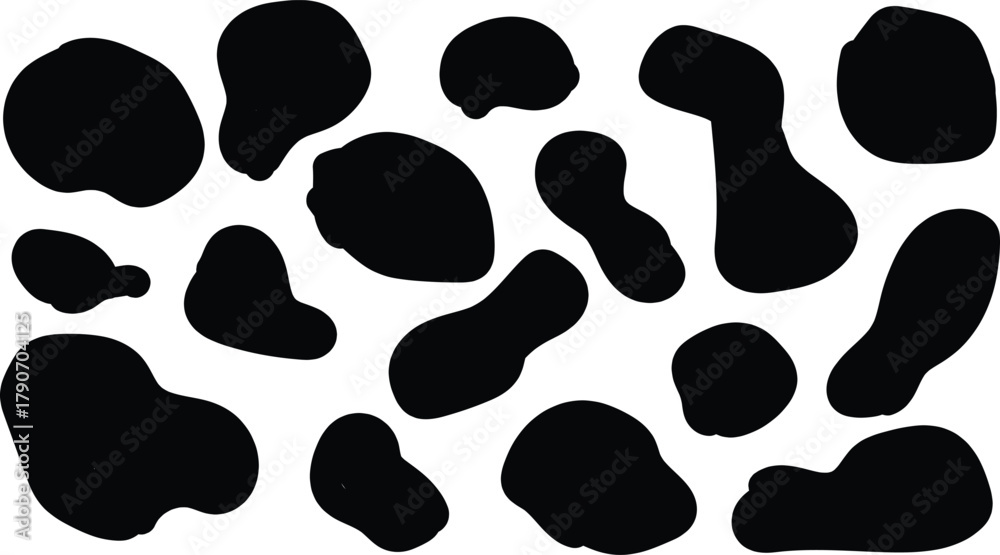 Fototapeta premium Abstract black organic shapes on a white background creating a dynamic pattern