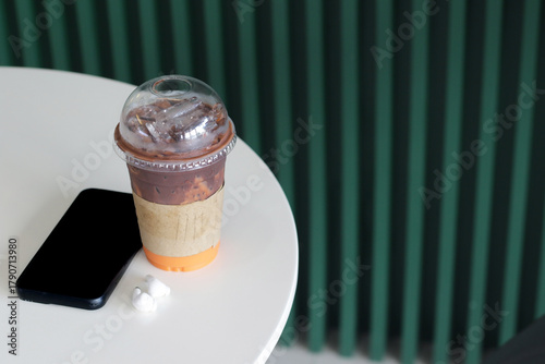 Fotografie Lifestyle of a relaxing day, drinking coffee and putting down the smartphone wit