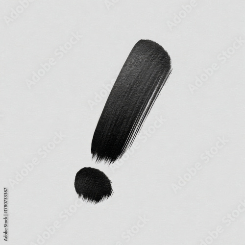  Black exclamation mark with a white paint splash, monochrome, representing a creative idea or sudden impact