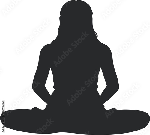 Silhouette of a woman meditating peacefully in a seated yoga pose
