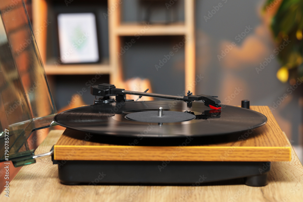 Obraz premium Modern turntable with vinyl record at home