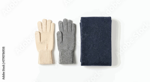 Knitted gloves and a folded scarf displayed on a clean white background flat lay