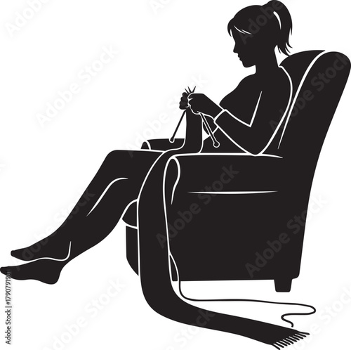Silhouette of a woman knitting comfortably in a cozy armchair relaxing hobby