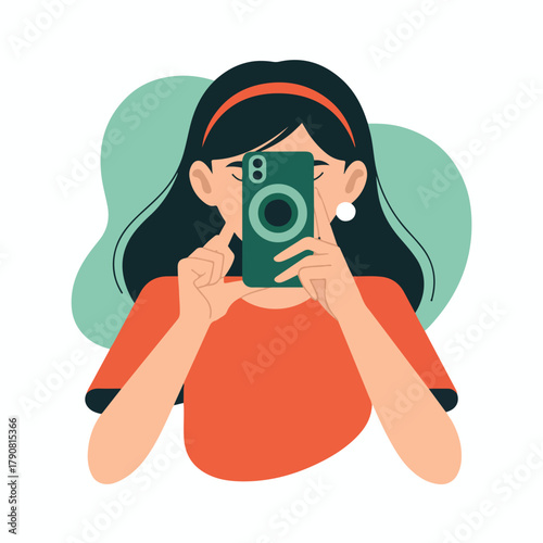 Young woman taking picture with smartphone