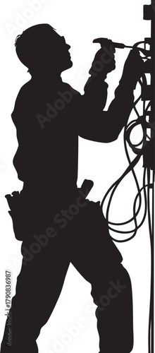 Silhouette of a skilled technician working on an electrical panel.
