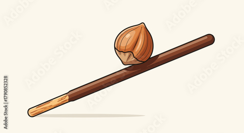 A Crunchy Hazelnut Perched on a Delicious Chocolate-Covered Biscuit Stick Concept