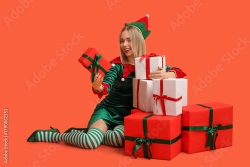Young woman in elf costume ...