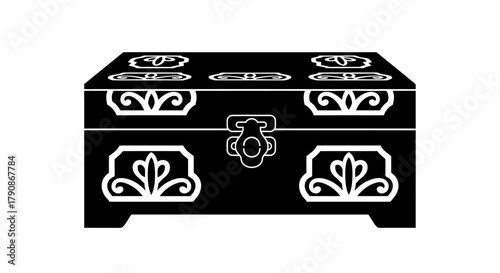 Elegant black wooden chest with intricate white floral and ornamental designs