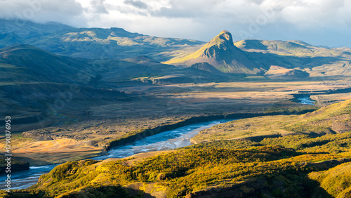 Beautiful sunset in the lush valley of Þórsmörk (Thorsmork) in Iceland’s southern highlands — a dramatic landscape of moss-covered mountains, glacial rivers