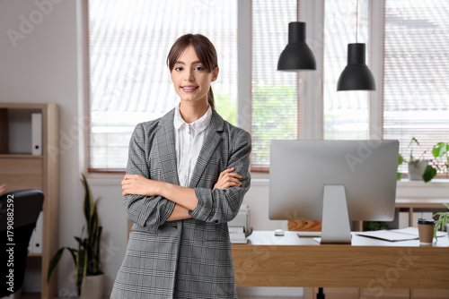 Confident young businesswom...