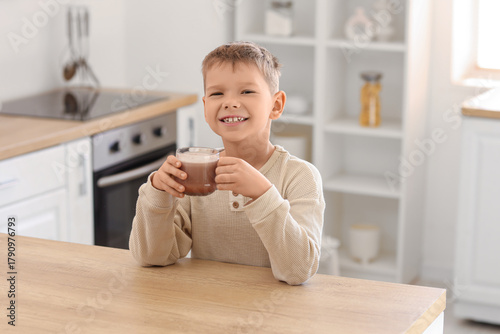 Cute little boy with cup of...
