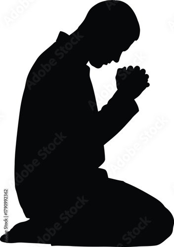 Silhouette of a person kneeling in prayer with hands clasped in devotion