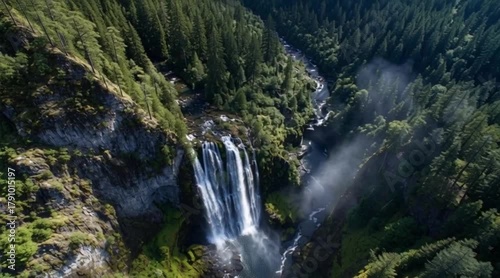 Majestic waterfall cascading through lush green forest, creating a dynamic scene of natural beauty and power, perfect for travel and nature inspiration