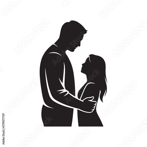 a couple embracing closely a man and woman in an intimate pose shown in black silhouette