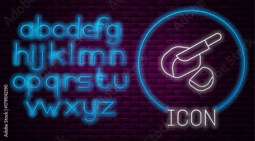 Glowing neon line Canadian peameal bacon icon isolated on brick wall background. Neon light alphabet. Vector