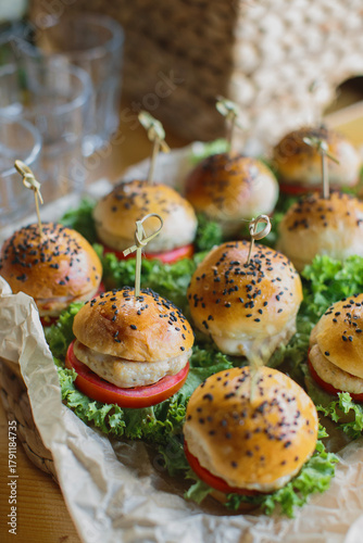 Mini burgers buffet serving appetizers at event
