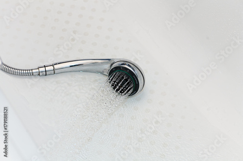 Water Streaming From Modern Handheld Shower Head