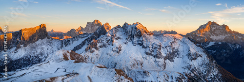 Photography Panorama of the Dolomites mountains during autumn sunrise