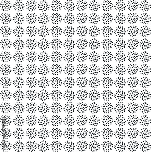 Circular masses of dots repeat to create texture.