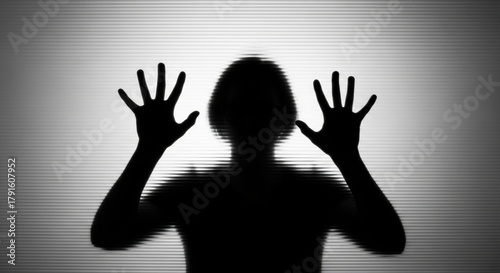 Silhouette of a Person Behind Frosted Glass with Hands Raised, Peering, Looking, Through