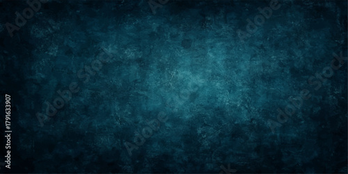 Dark blue grunge texture background with space for text, displaying a dirty, aged, rough wall pattern