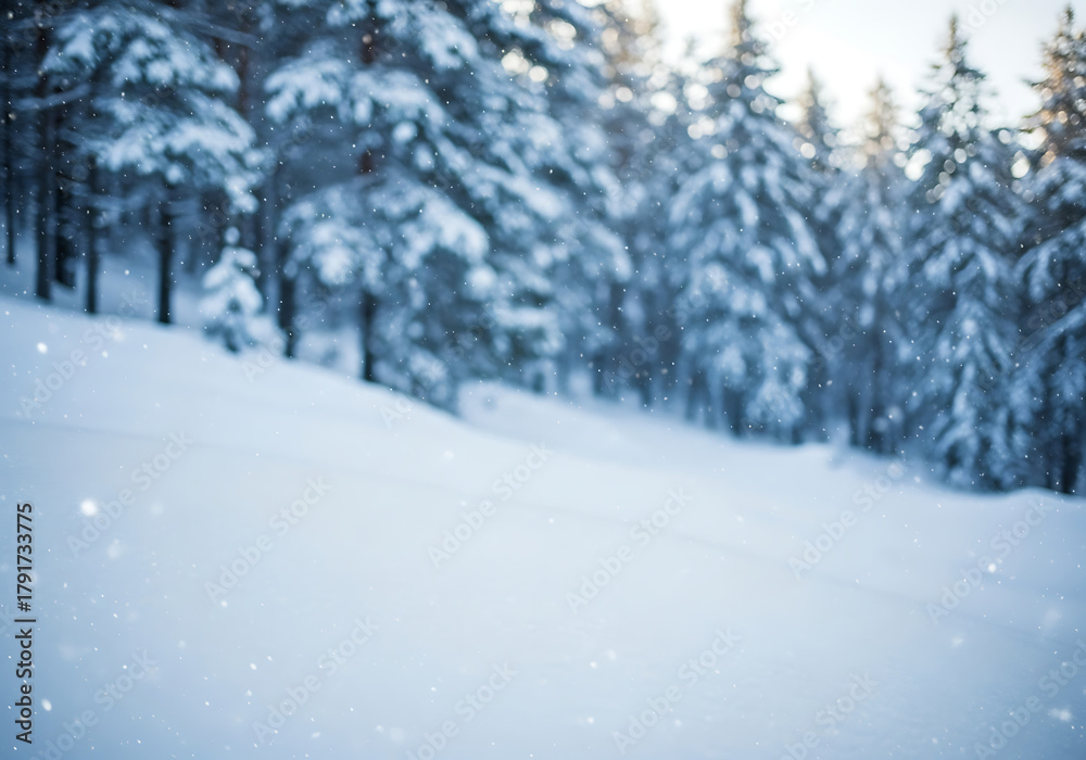 Naklejka premium Snowy Winter Landscape with Blurred Forest Background and Copy Space for Christmas Design