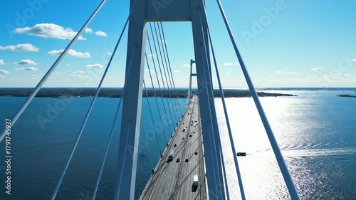 Cars Driving Across Chesapeake Bay Bridge on Bright Day
