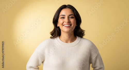Beautiful Young Woman with Radiant Smile in Casual Sweater
