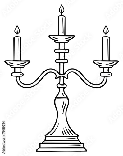 Ornate three-armed candlestick with lit candles elegant design