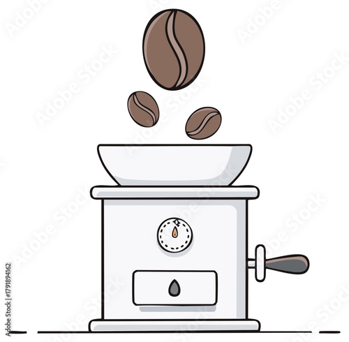 Fresh coffee beans falling into a classic manual grinder for traditional brewing preparation