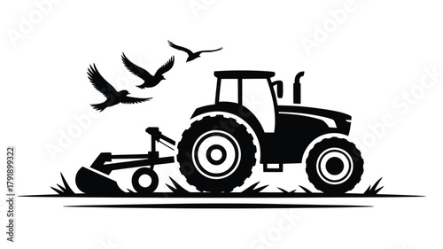 A black silhouette of a tractor plowing a field with birds flying overhead.