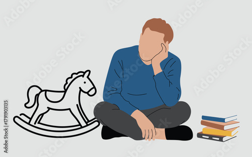 A person sits on the floor next to a rocking horse and a stack of books, looking thoughtful.