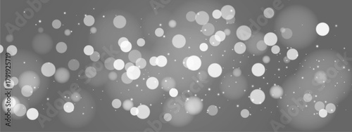 Gray bokeh wallpaper with white light circles and blur background. Abstract texture featuring bright spots, sparkle dots, glowing particles across gradient. Vector effect