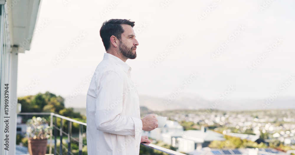 Naklejka premium Man, thinking and balcony with coffee for morning start, fresh air or view in neighborhood. Thoughtful, male person or drinking with cup, mug or caffeine beverage on terrace for vision on space
