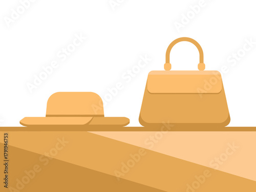 A stylish hat and a handbag are displayed on a flat surface, ready for an outing.