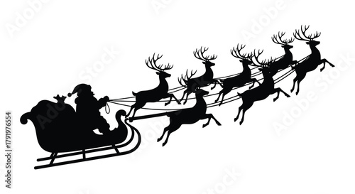 Silhouette of santa claus in a sleigh pulled by eight reindeer flying across the night sky