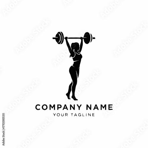 Silhouette of a female weightlifter powerfully lifting a barbell overhead, showcasing strength and fitness.