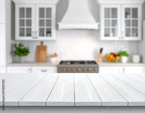 Empty white wooden table in front of a modern kitchen