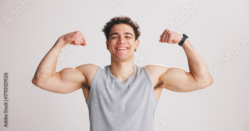 Fotografi Portrait, man and flex bicep for fitness, strength and workout progress in studio